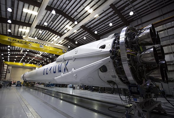 Advanced spacecraft in a hangar, showcasing the intricate engineering behind space exploration technology